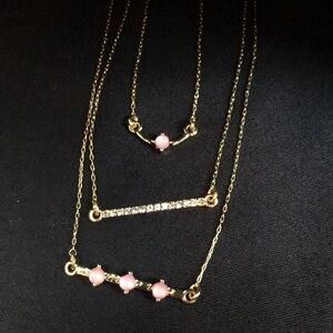 Bauble bar triple strand gold necklace pink stones